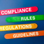 Colored ice cream stick with the word COMPLIANCE RULES REGULATIONS GUIDELINES.